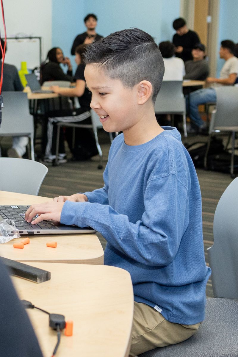 Image shows 11-year-old Matthew Howard in class at UTA " style=" height:1200px; width:800px" _languageinserted="true" src="https://cdn.prod.web.uta.edu/-/media/project/website/news/releases/2025/11/zee-family-inside-2.jpg