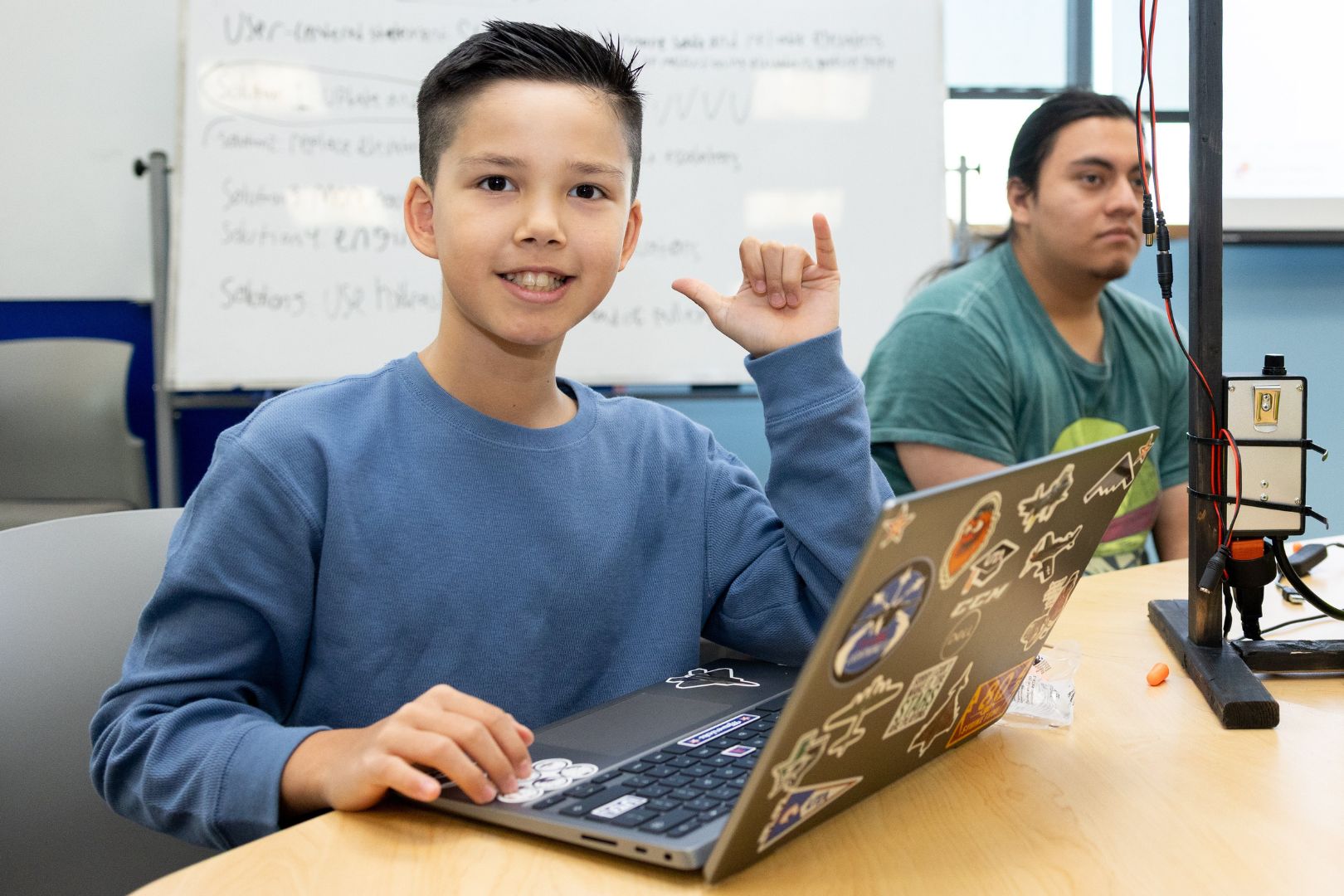 Image shows 11 year old Matthew Howard Maving up " style=" height:1080px; width:1620px" _languageinserted="true" src="https://cdn.prod.web.uta.edu/-/media/project/website/news/releases/2025/11/zee-family-inside.jpg