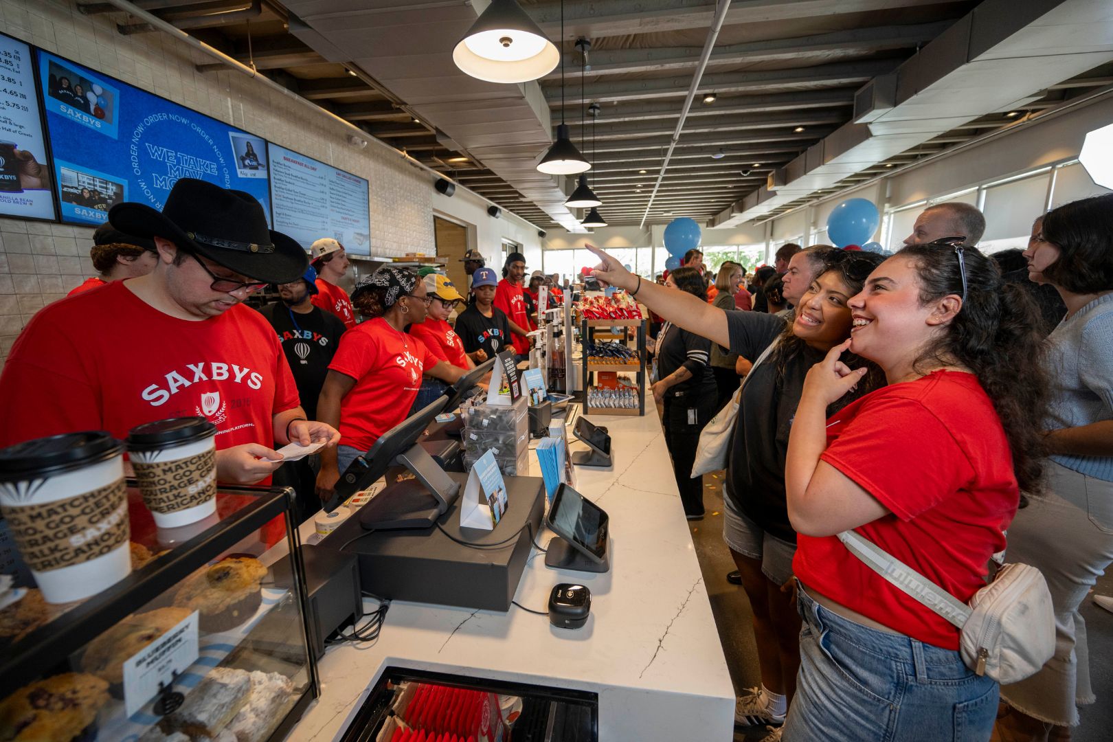 Image shows UTA students ordering Saxbys coffee during the grand opening" style=" height:1080px; width:1620px" _languageinserted="true" src="https://cdn.prod.web.uta.edu/-/media/project/website/news/releases/2026/08/sax-inside.jpg