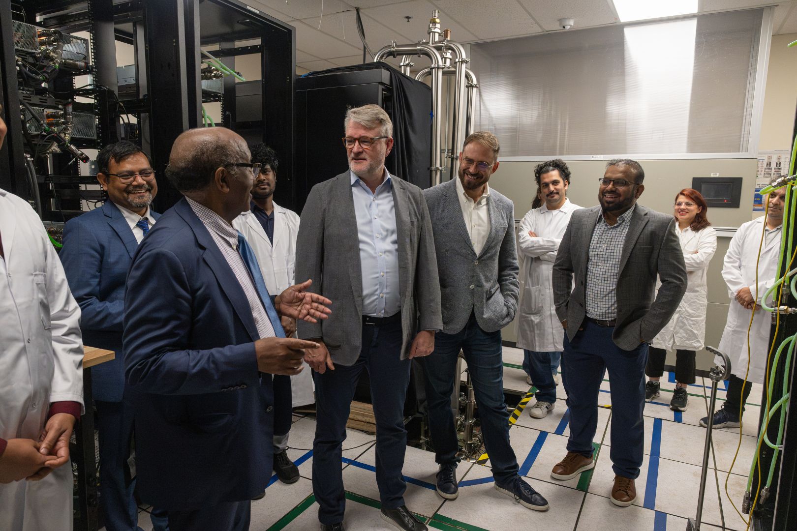 Image shows Dr. Dereje Agonafer with Johnson Controls CEO Joakim Weidemanis meeting at UTA