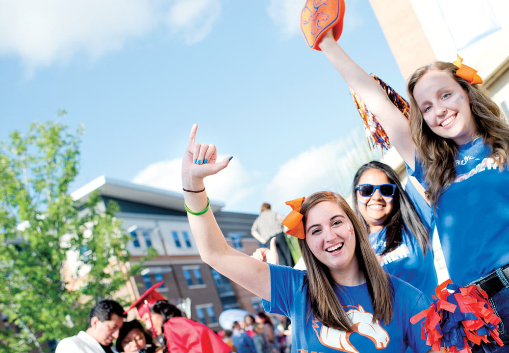Freshmen students cheering.