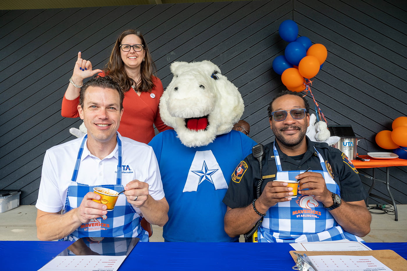 President Cowley and Blaze with the two winners of the 2022 Chili Cook Off