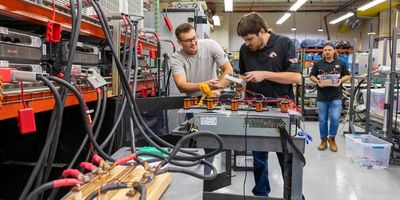 UTA researchers work in a laboratory.