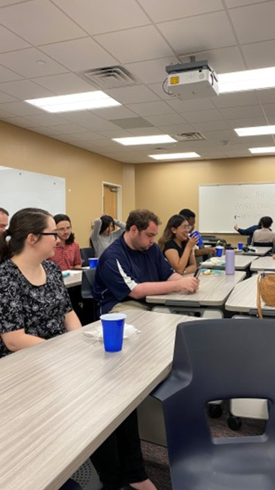 Students in classroom on research trip