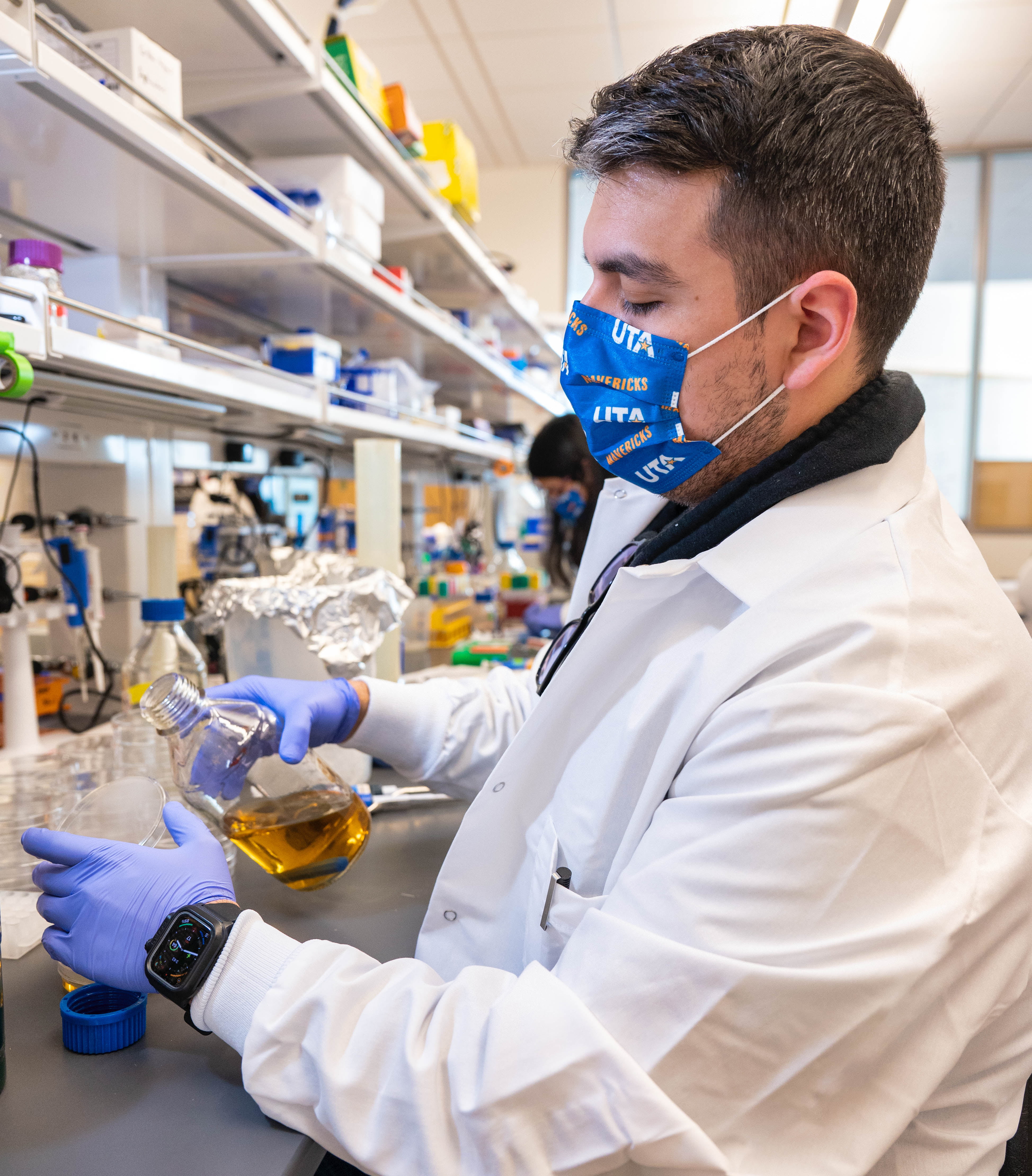 A scientist performing a chemical experiment