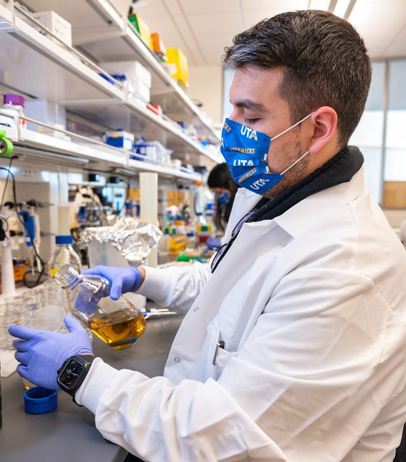 A scientist performing a chemical experiment