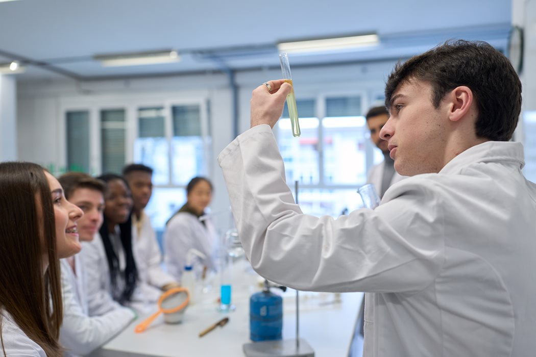 A group of people working in a chemistry lab