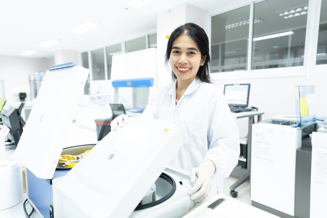 Girl in a medical coat posing for a photo