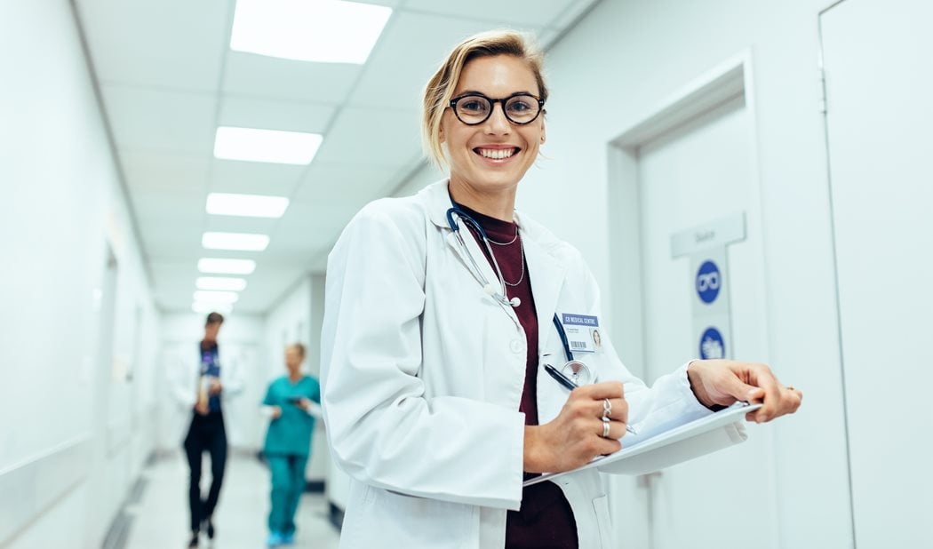 A doctor posing for a photo