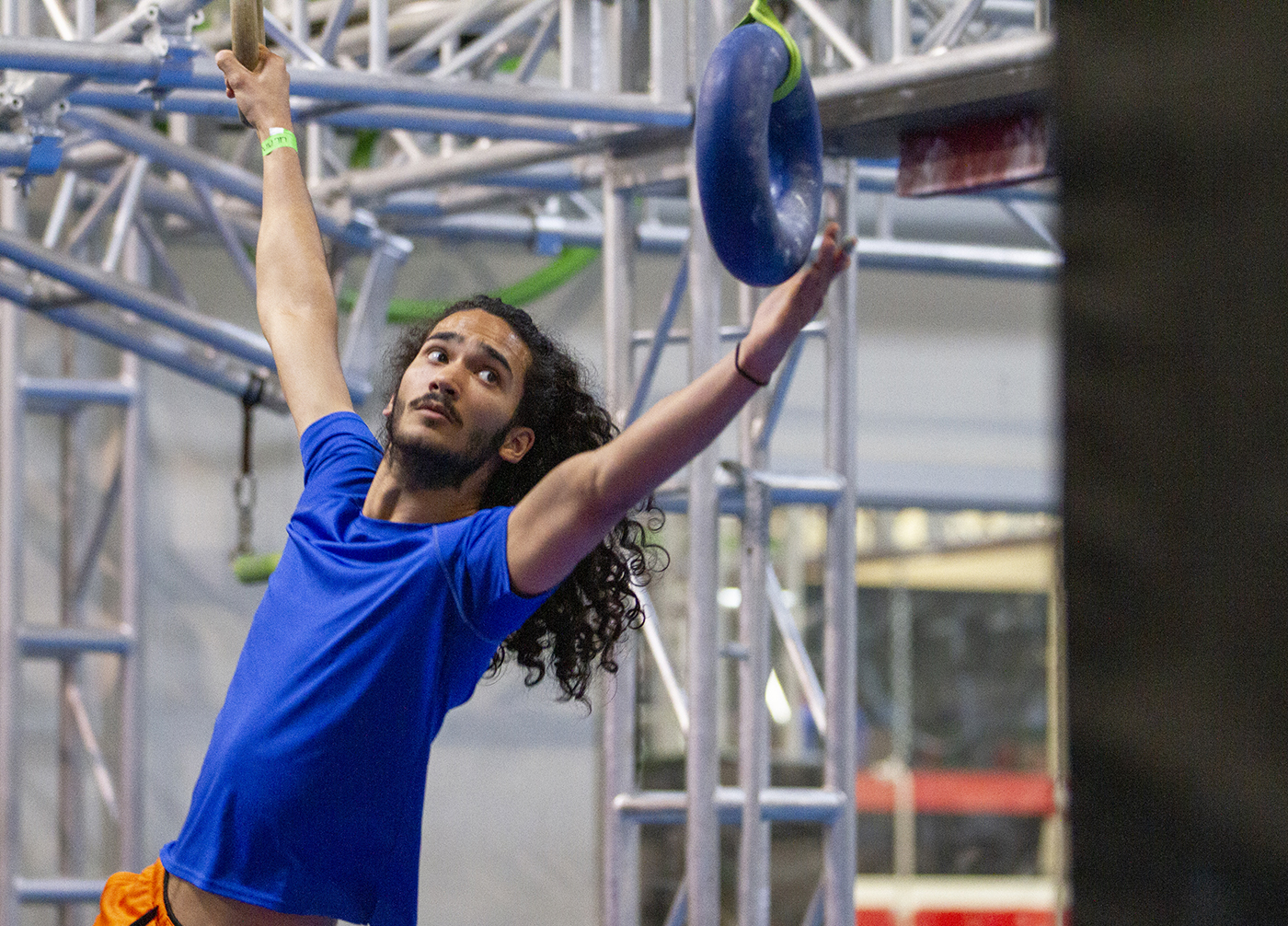Nicki Asirvadam, UTA mathematics major, practices on an obstacle course at a gym in Dallas.