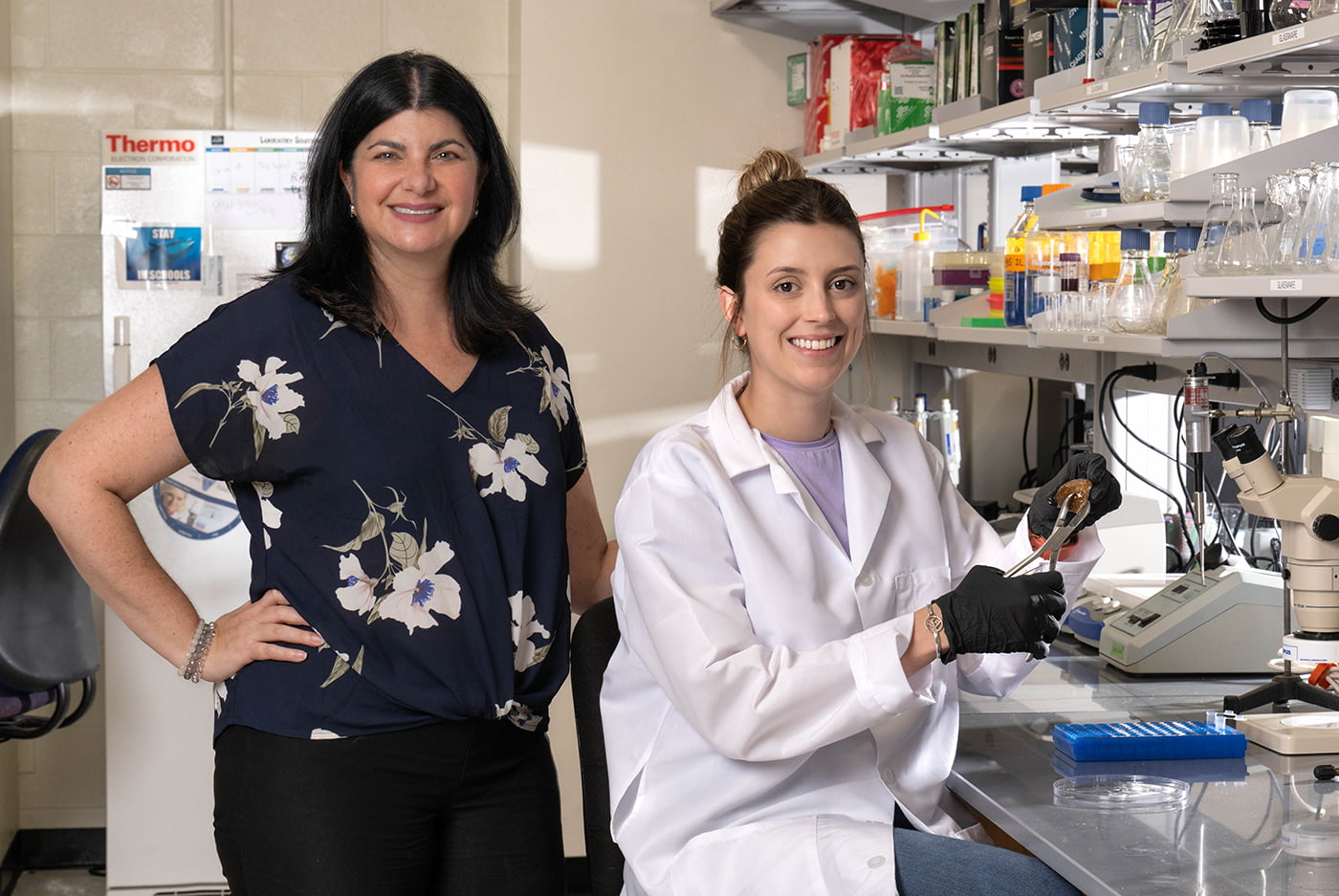 Laura Mydlarz, UTA professor of biology, left, and Ph.D. student Kelsey Beavers