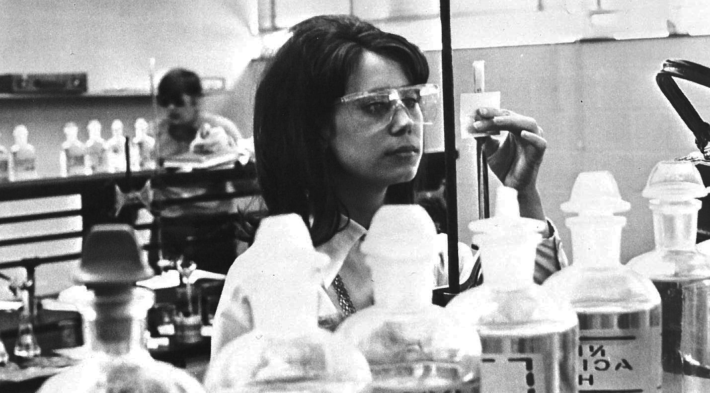 A student works in a chemistry lab in 1969.