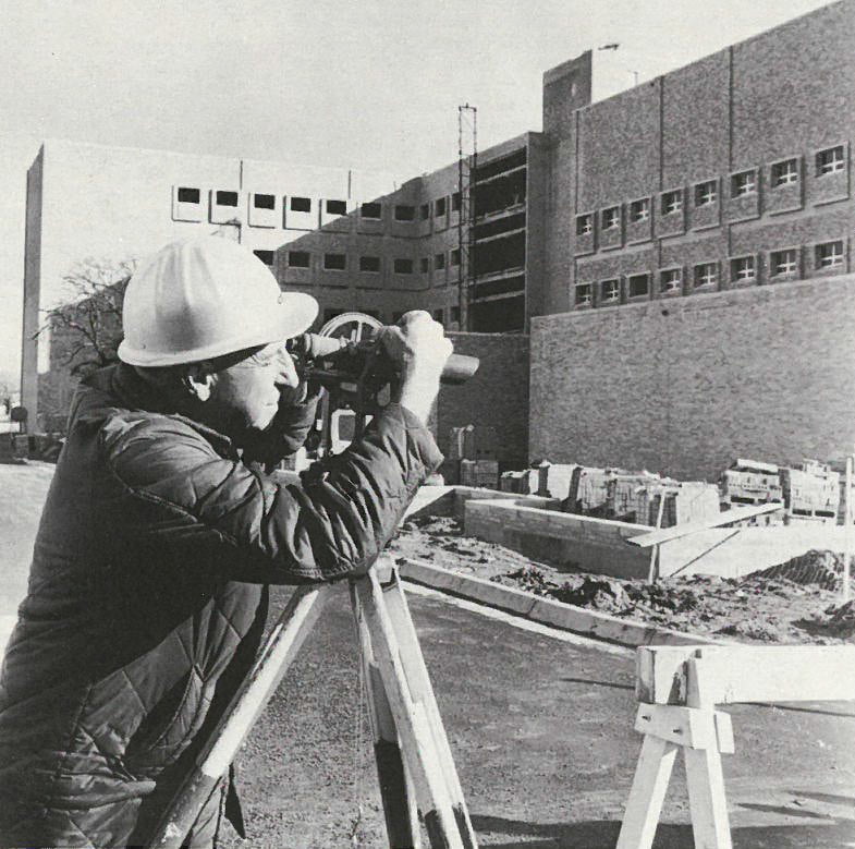 A worker surveys the site during construction of the Life Sciences Building in 1969. The building opened in 1970