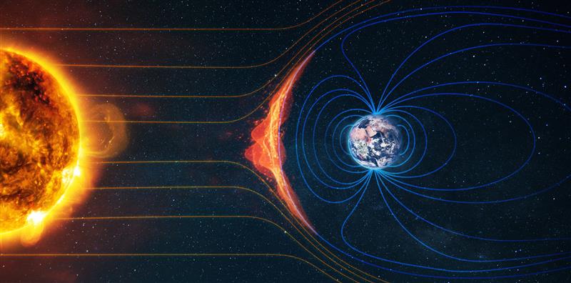 Illustration of Earth's magnetic field shielding the planet from solar wind and radiation from the sun.