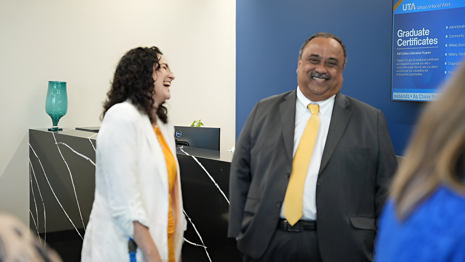 UTA School of Social Work Associate Dean for Research, Tonya Hansel and Interim Dean for the School of Social Work, Goutham Menon