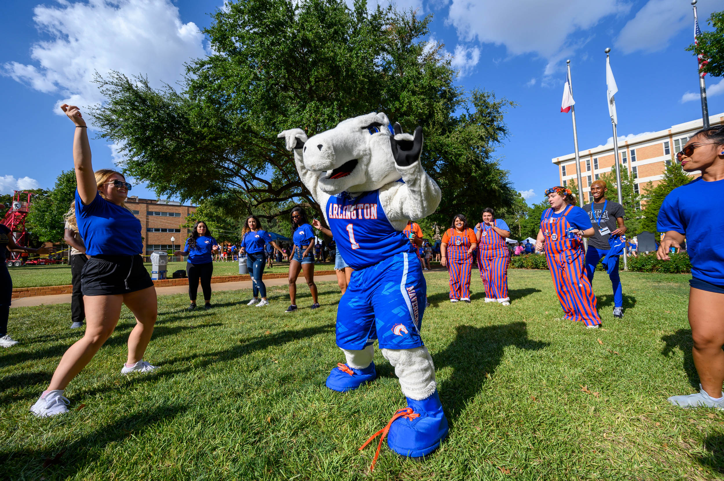 UTA Mascot and students assembled together