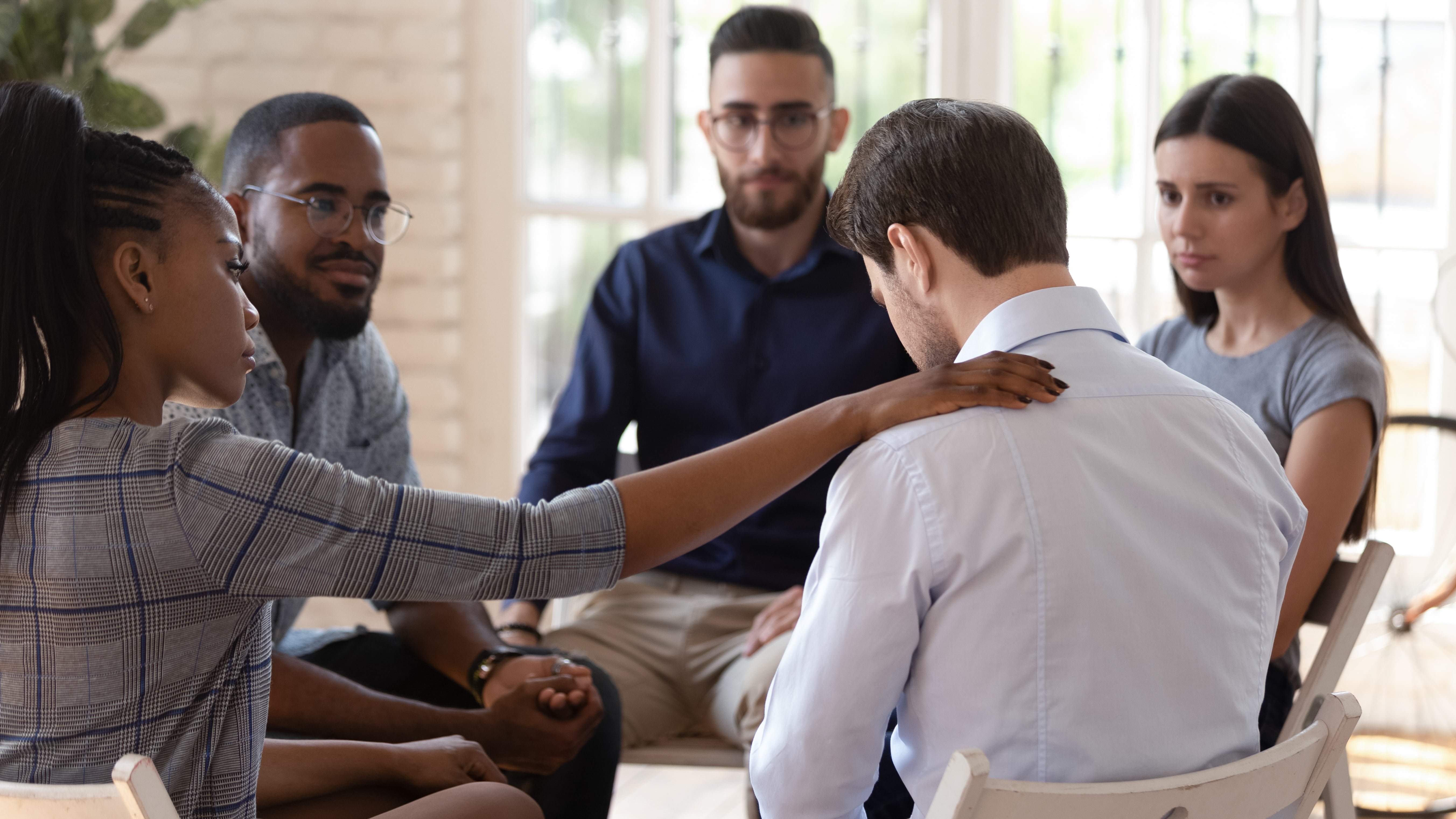 5 people in a drug counseling session