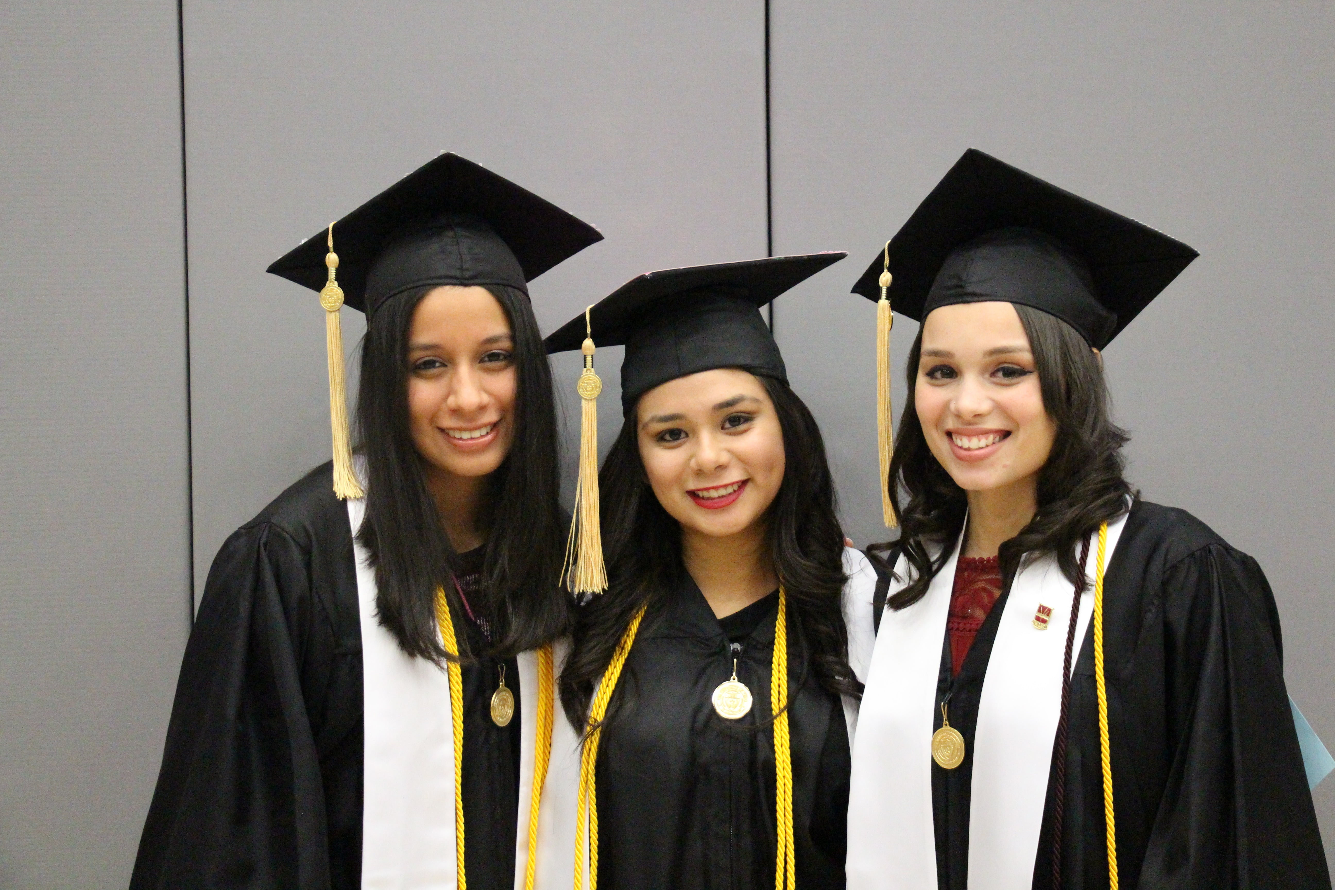 Student taking graduation photos