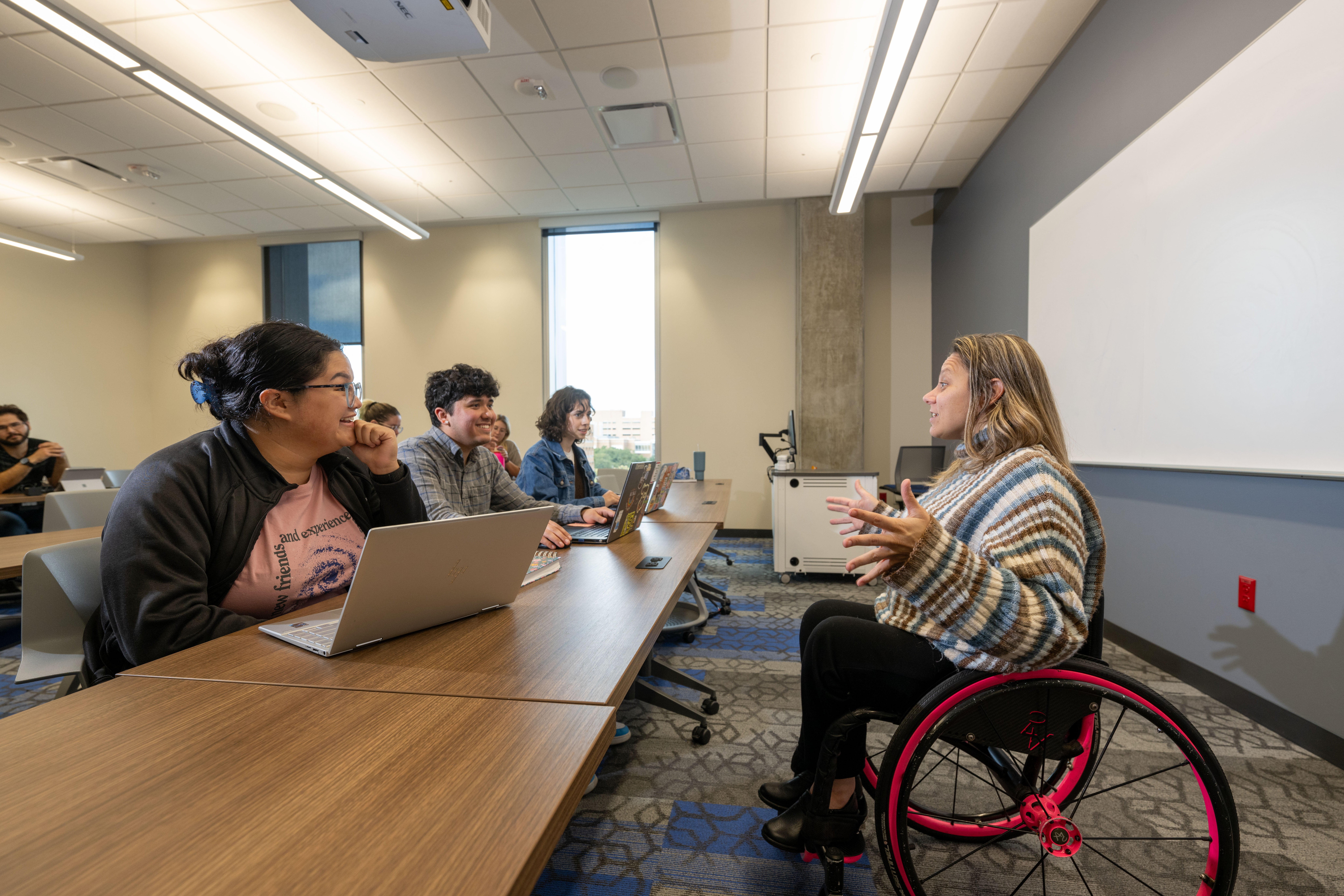 Dr. Darlene Hunter, director of undergraduate programs, associate professor of practice and Paralympic gold medalist, teaches at class at UT Arlington on January 13, 2025. 