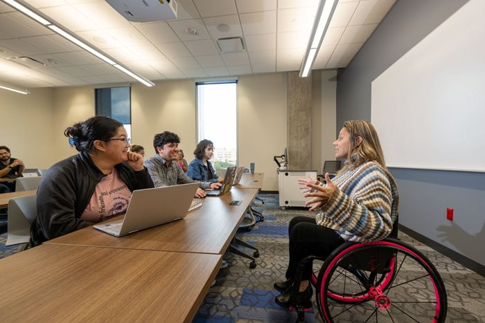Dr. Darlene Hunter, director of undergraduate programs, associate professor of practice and Paralympic gold medalist, teaches at class at UT Arlington on January 13, 2025.