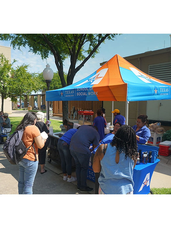 School of Social Work event with students at booth