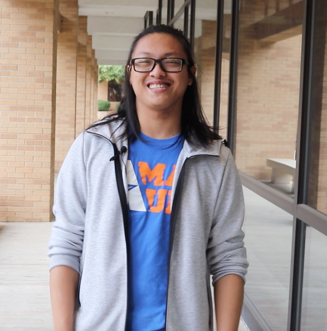 Student smiling on campus