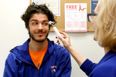 A student getting a medical checkup