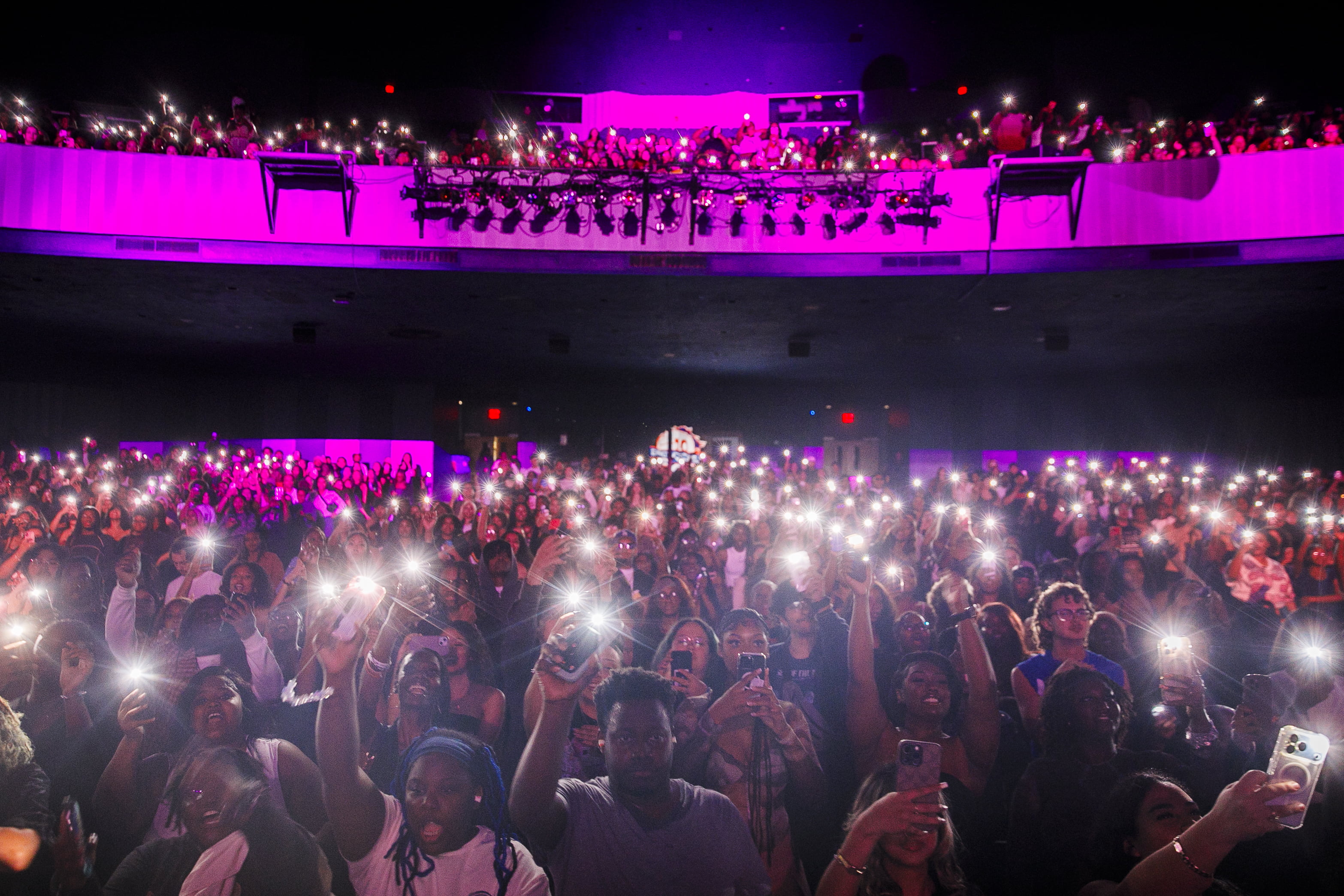 Picture of the audience with their phone flash on