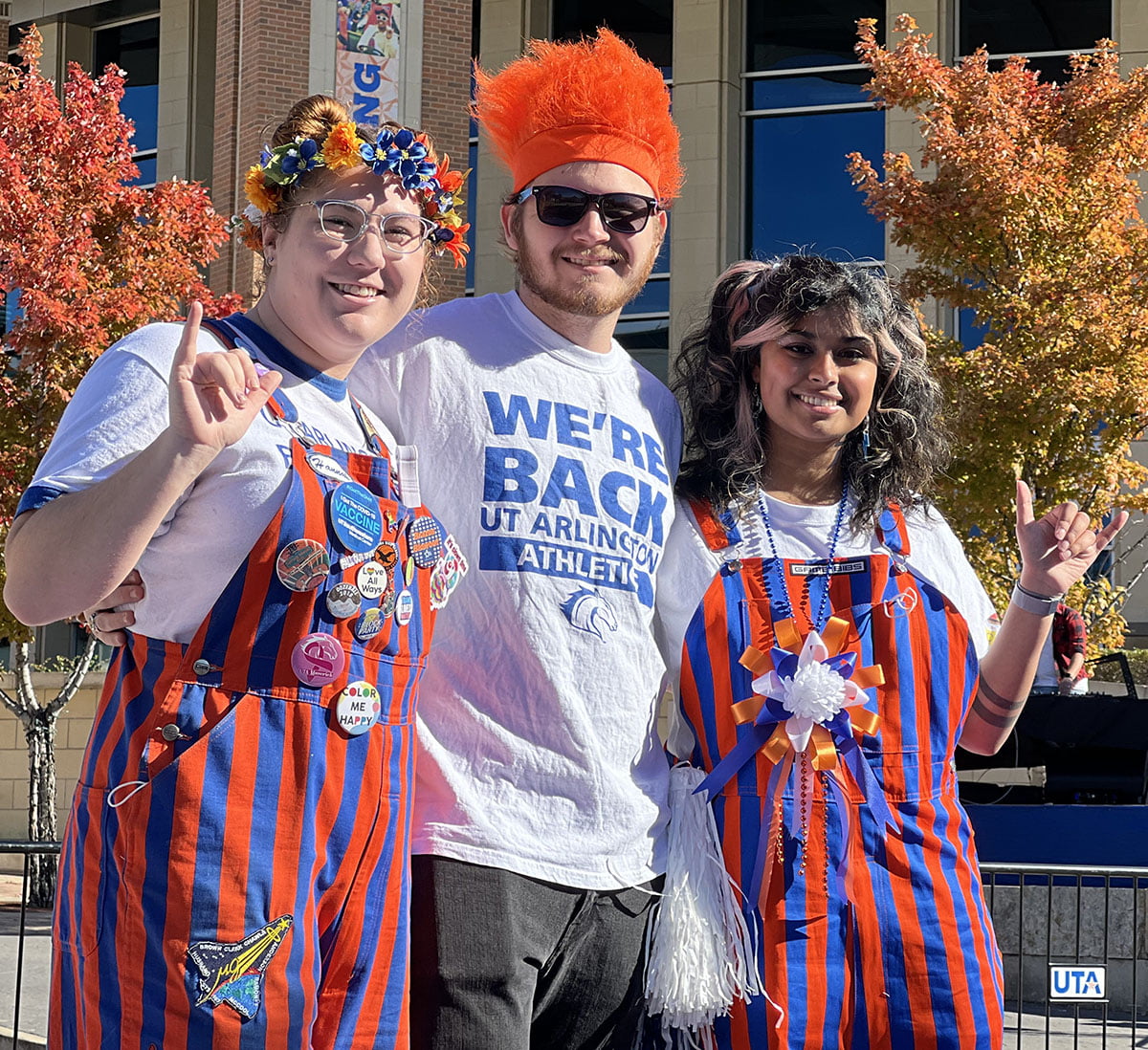 maverick wranglers posing at the homecoming parade