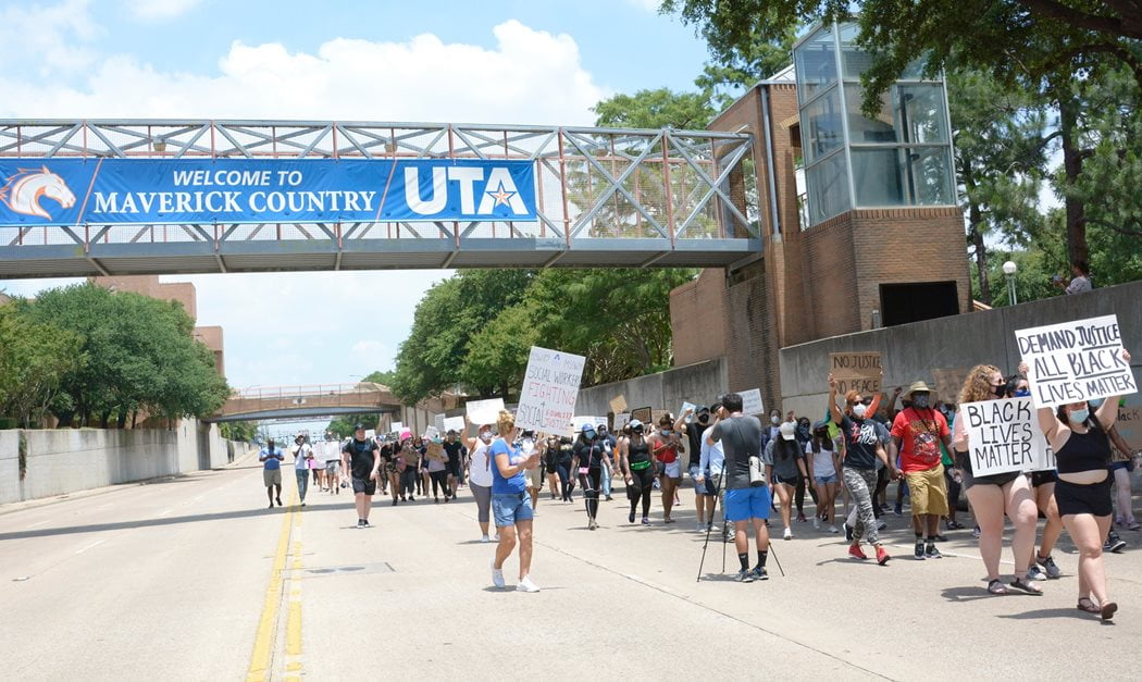 Protesters marching on Cooper Street
