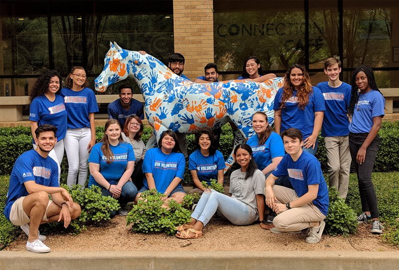 Spirit group team with a blaze statue.