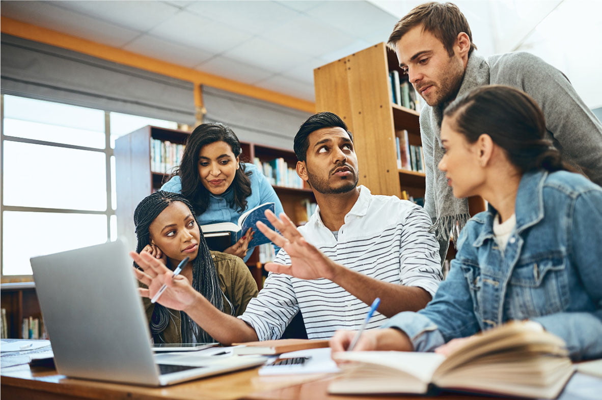A group of students conversing with each other