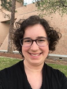 Posed image of Emily smiling at the camera